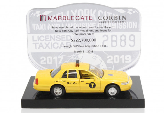 model-taxi-and-medallion-on-portfolio-acquisition-tombstone.jpeg